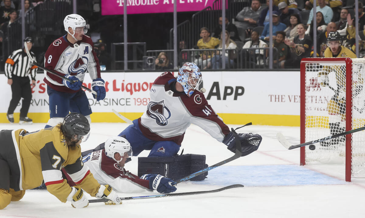 Golden Knights center William Karlsson (71) knocks the puck into the net past Colorado Avalanch ...