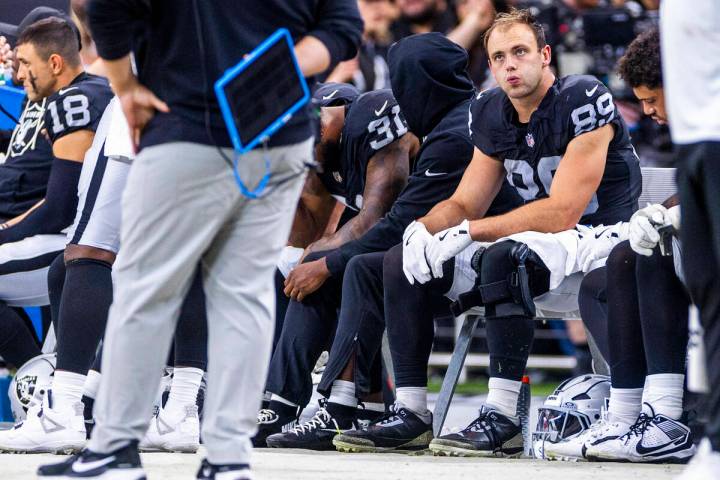 Raiders tight end Brock Bowers (89) is a bit dismayed while sitting on the bench against the Ch ...