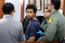 Stanley Weaver, center, accused of stalking Gov. Joe Lombardo, scans the courtroom as he appear ...