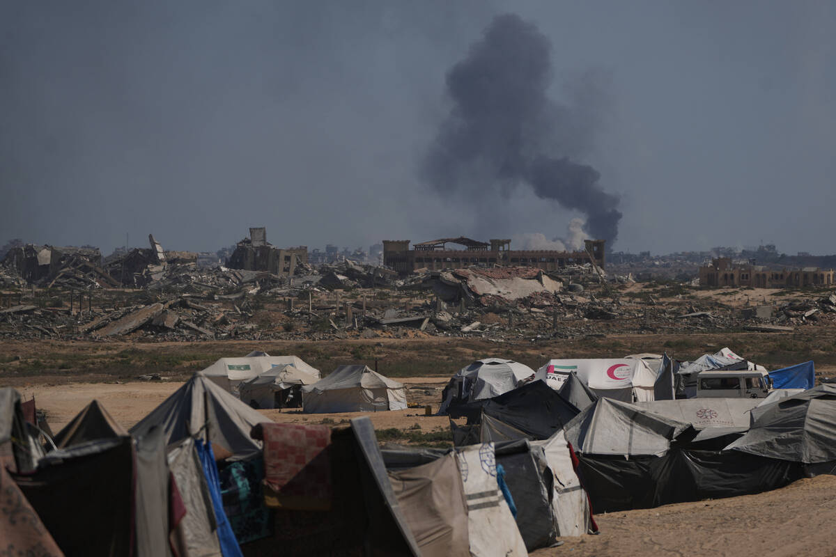 Smoke rises to the sky following an Israeli military strike in Gaza City, as seen from the cent ...