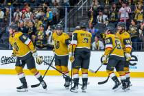 Golden Knights center Jack Eichel (9) and teammates celebrate his goal against the Utah Mammoth ...