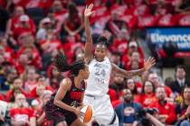 Las Vegas Aces guard Jewell Loyd (24) defends Indiana Fever guard Kelsey Mitchell (0) during th ...