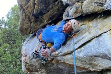 Alaskan climber Balin Miller climbing the route "Croc’s Nose" at Crocodile Rock in Hyalite Ca ...