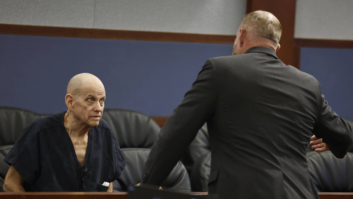 Michael Atwell, left, an ex-Palo Verde teacher and coach who sexually abused children, speaks w ...