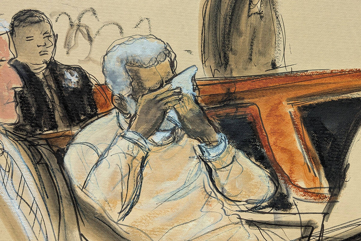 In this courtroom sketch, Sean Diddy Combs breaks down and cries during the playing of a video ...