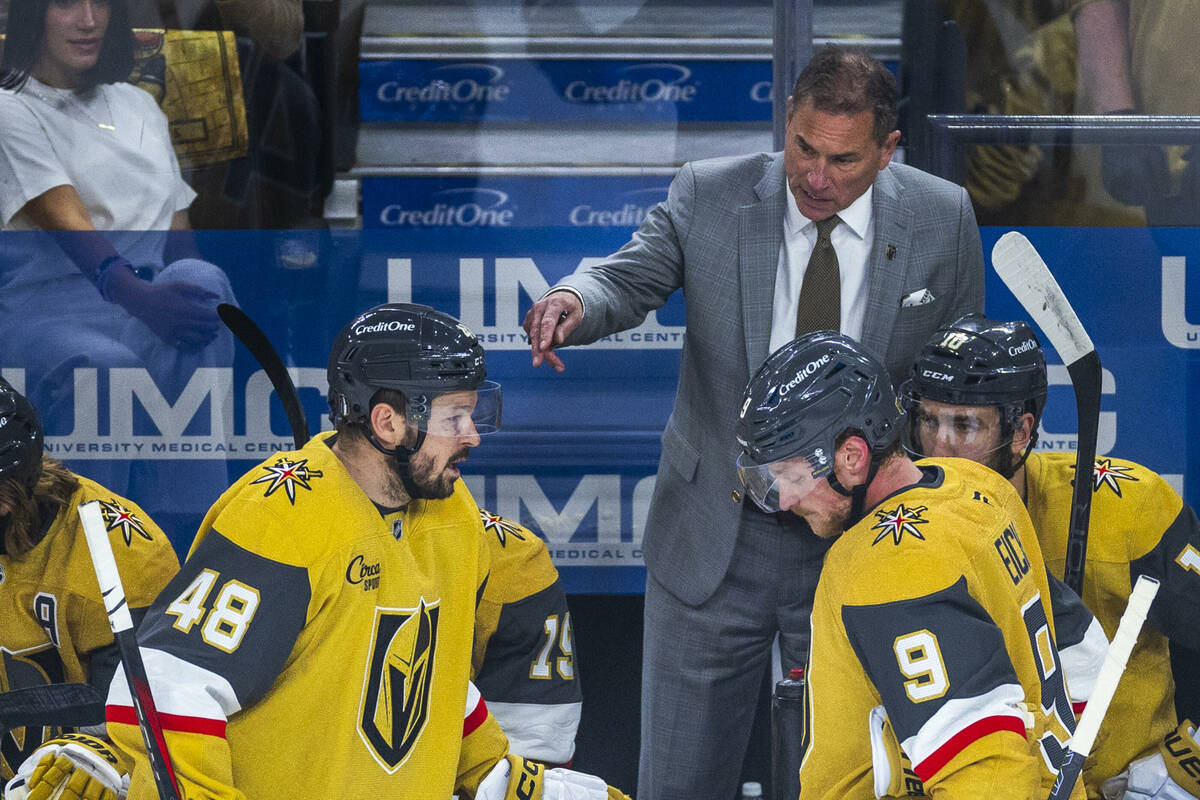 Golden Knights head coach Bruce Cassidy speaks with center Tomas Hertl (48) and center Jack Ei ...