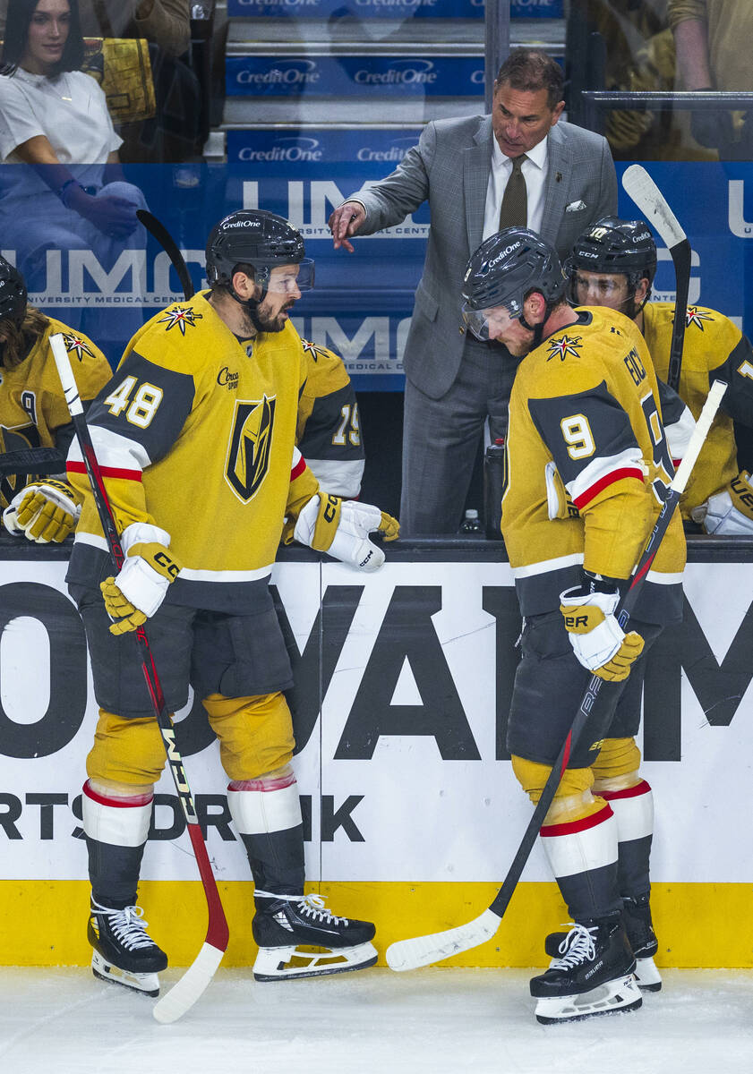 Golden Knights head coach Bruce Cassidy speaks with center Tomas Hertl (48) and center Jack Ei ...