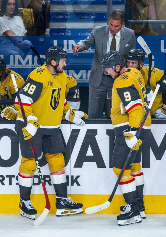 Golden Knights head coach Bruce Cassidy speaks with center Tomas Hertl (48) and center Jack Ei ...