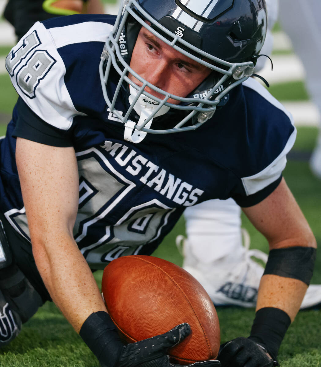 Shadow Ridge running back Hawkin Ledingham (38) gets up after being tackled during the game on ...