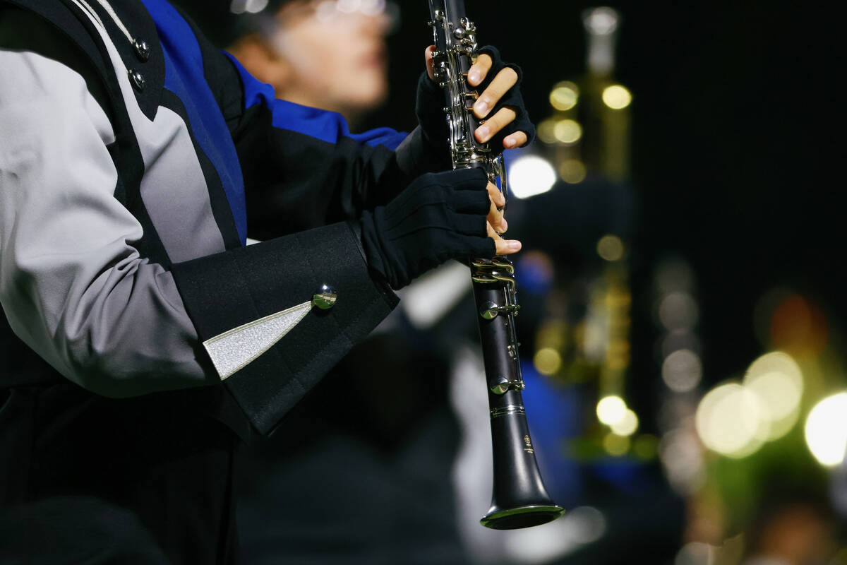 Shadow Ridge’s marching band performs “Echos of the Past” during halftime ...