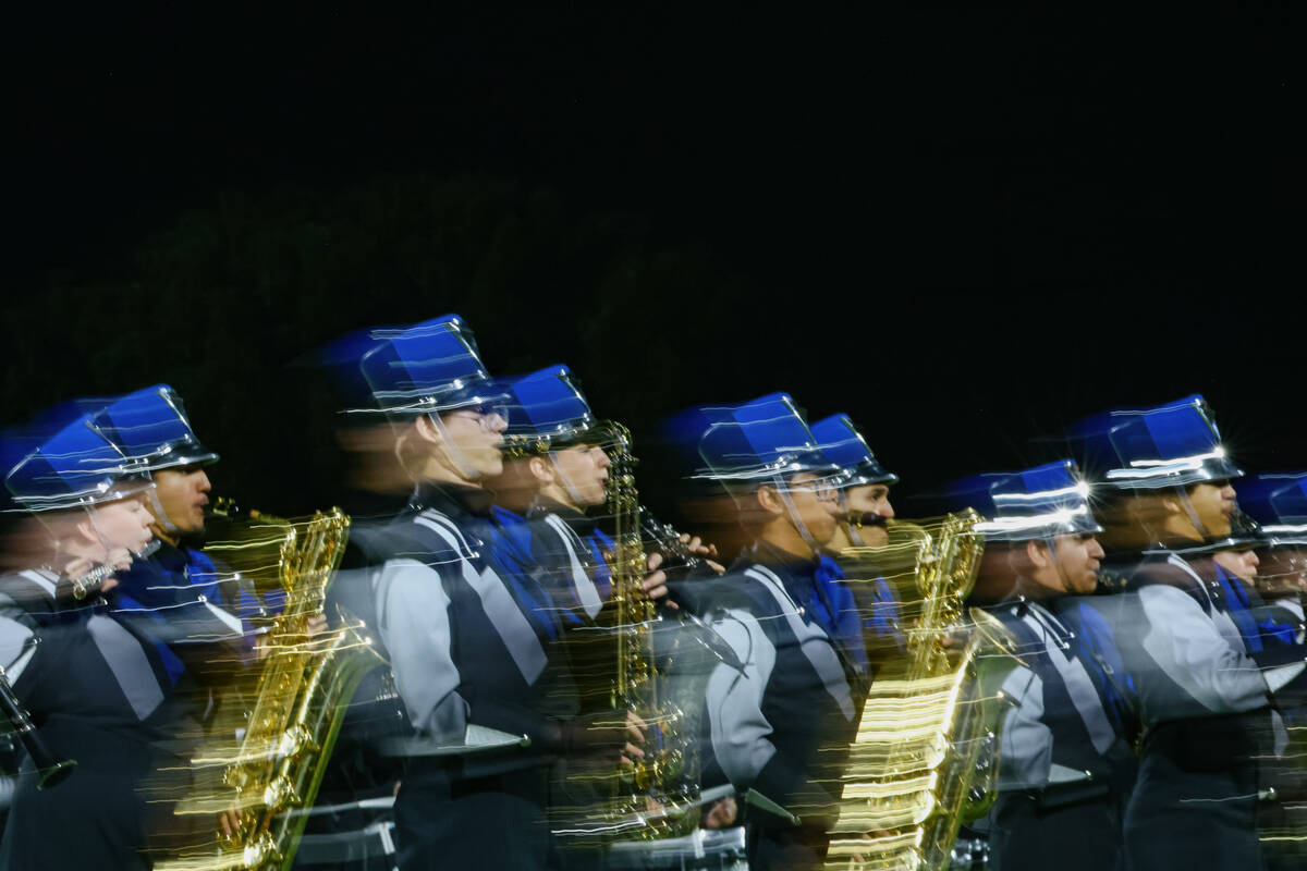 Shadow Ridge’s marching band performs “Echos of the Past” during halftime ...