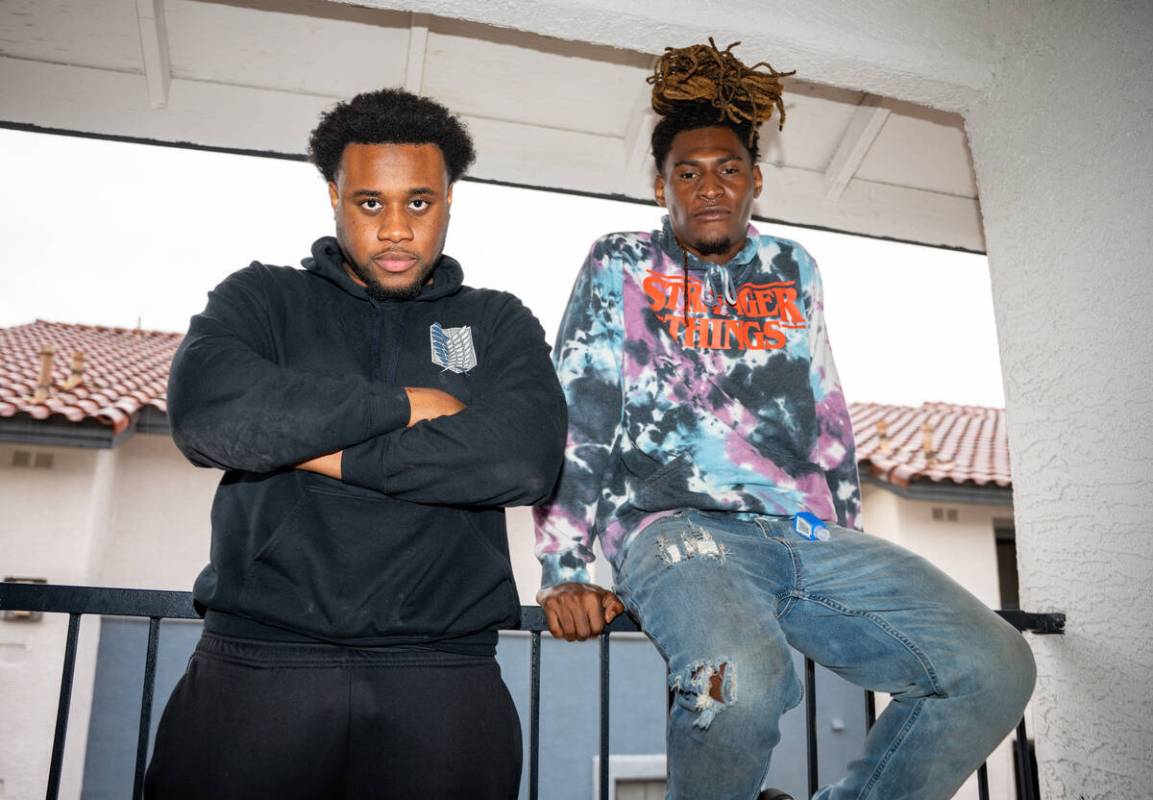 Isaiah Thompson (left) and Shawn Herron (right) pose for a portrait at their apartment in Las V ...