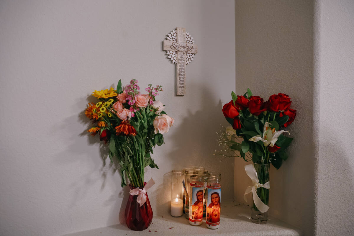 Flowers and candles sit in the apartment on Friday, Oct. 3, 2025 in the apartment where 27-year ...
