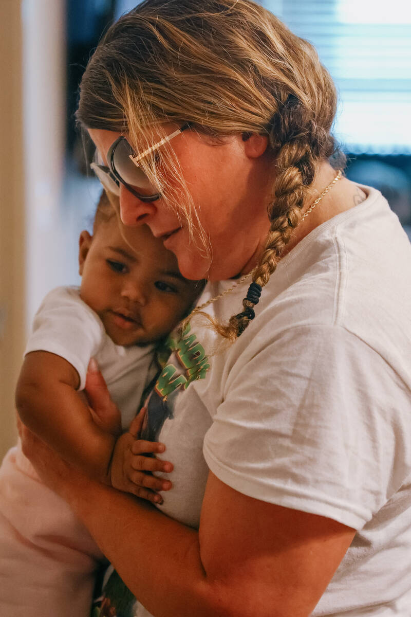 Allison Tarlini holds her 7-month-old granddaughter on Friday, Oct. 3, 2025 in the apartment wh ...