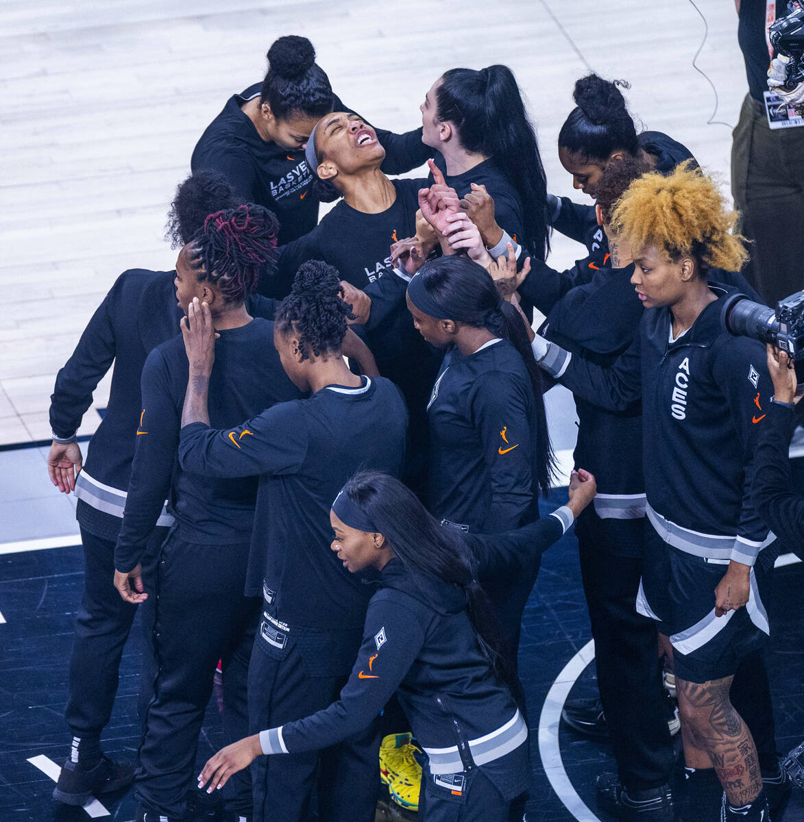 Aces center A'ja Wilson (22) motivates her teammates in a huddle as they ready to face the ...