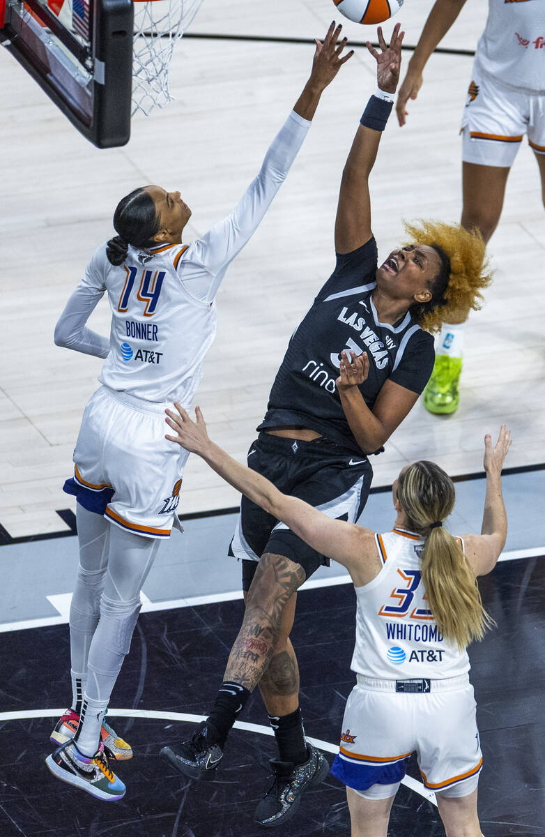 Aces forward NaLyssa Smith (3) elevates to take a shot over Phoenix Mercury forward DeWanna Bon ...