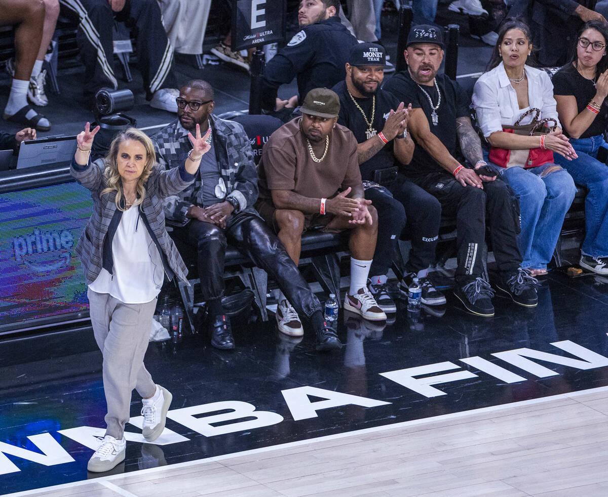 Aces head coach Becky Hammon signals to her players against the Phoenix Mercury during the seco ...
