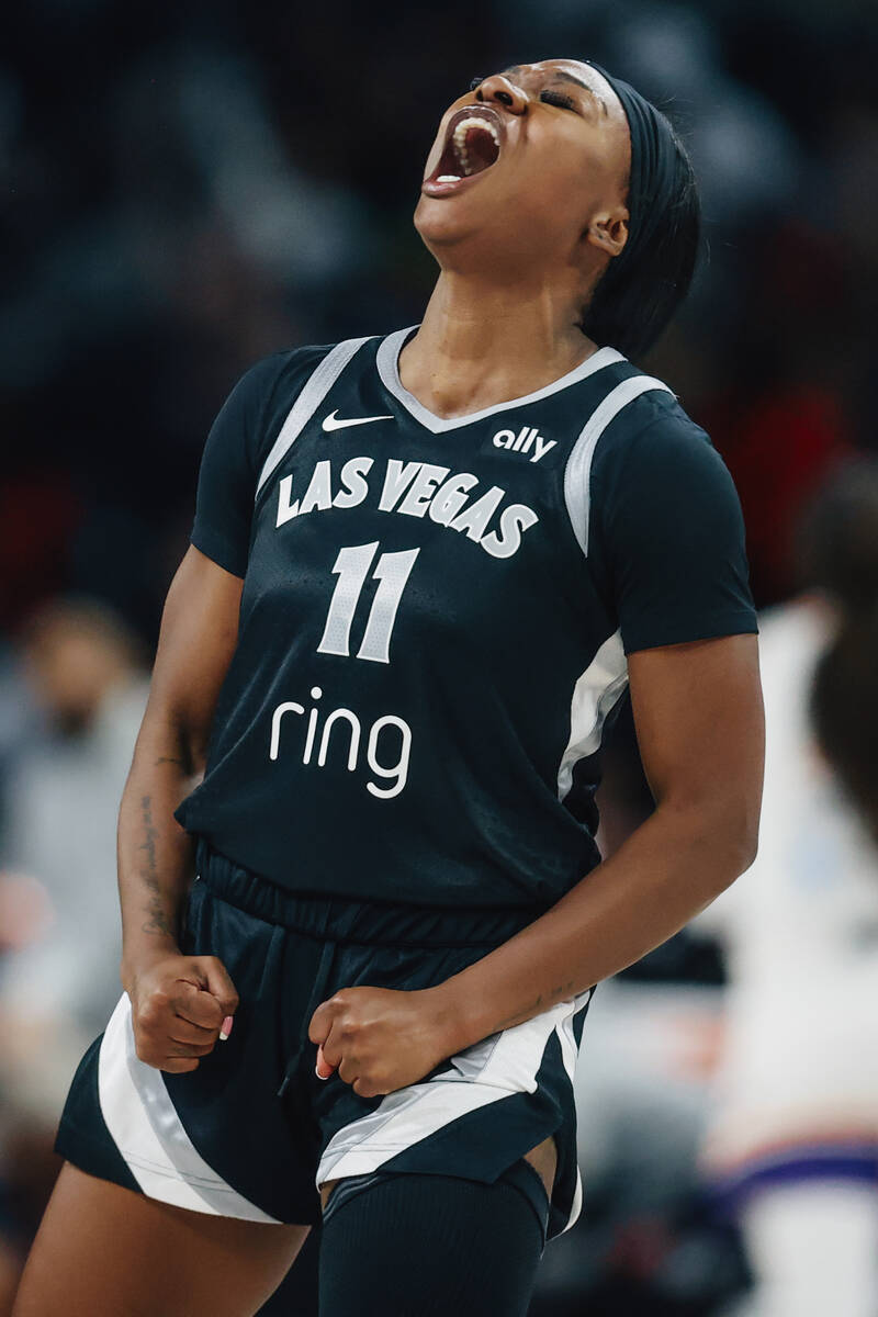 Aces guard Dana Evans celebrates during game one of a WNBA finals basketball game between the A ...