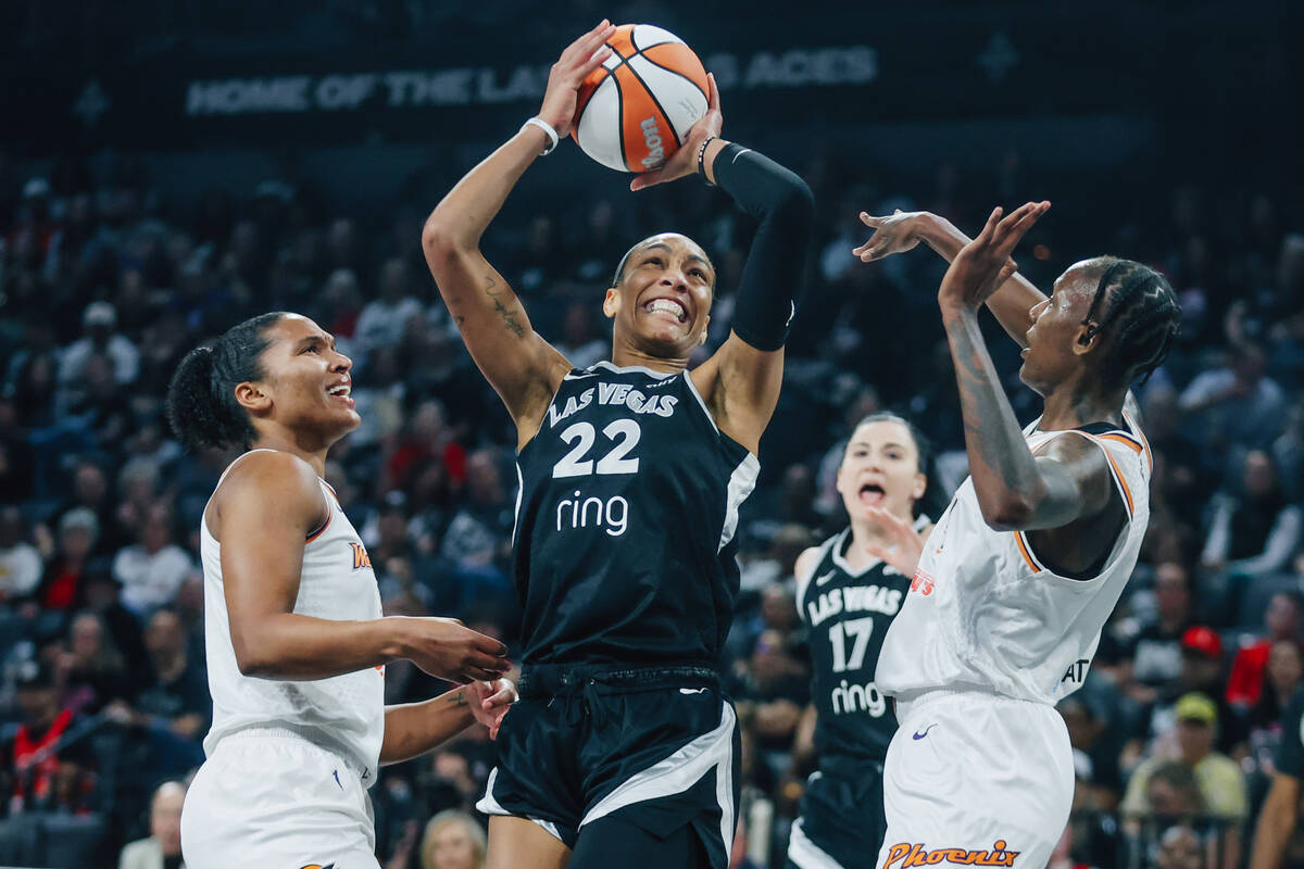 Aces center A'ja Wilson (22) goes up for a basket during game one of a WNBA finals basketb ...