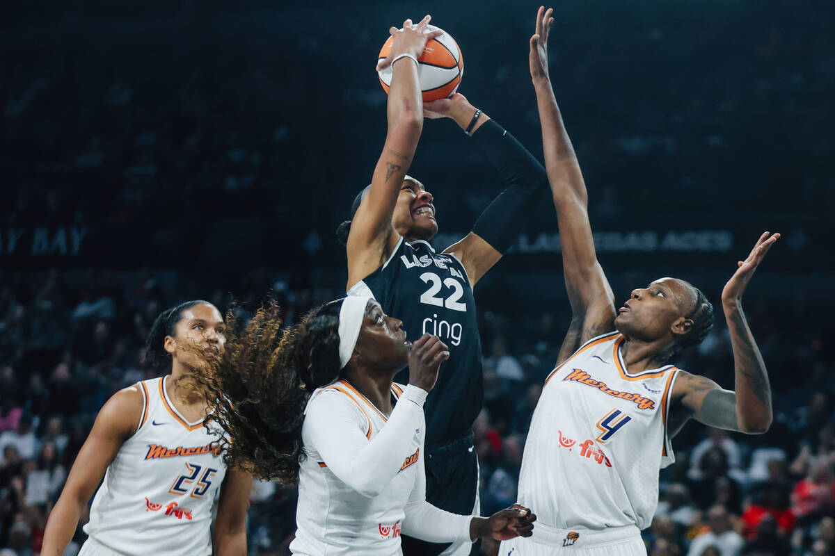 Aces center A'ja Wilson (22) goes up for a basket during game one of a WNBA finals basketb ...