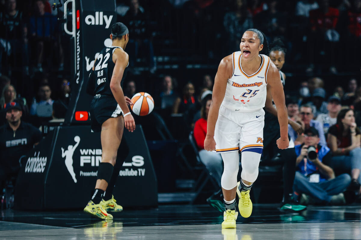 Phoenix Mercury forward Alyssa Thomas (25) yells as she runs down the court during game one of ...
