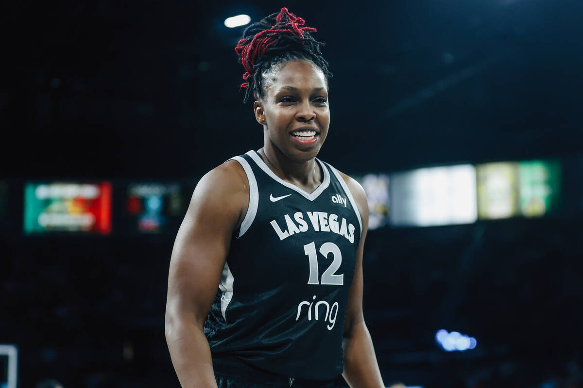 Aces guard Chelsea Gray (12) smiles during game one of a WNBA finals basketball game between th ...