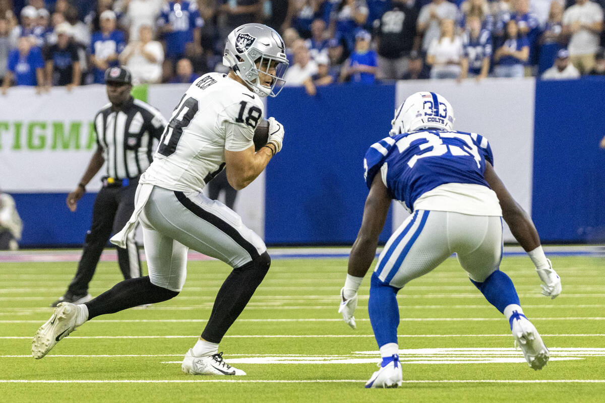Raiders wide receiver Jack Bech (18) makes a catch against Indianapolis Colts cornerback Mike H ...