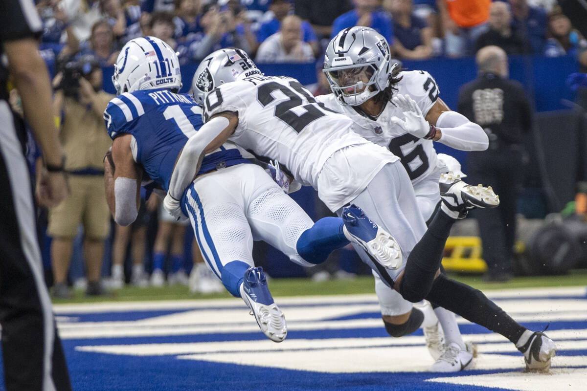 Indianapolis Colts wide receiver Michael Pittman (11) lays out in the end zone for a touchdown ...