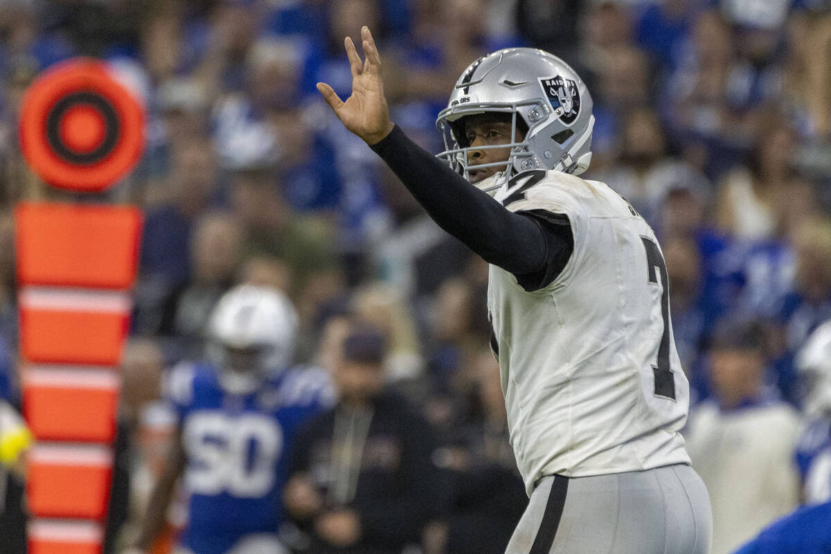 Raiders quarterback Geno Smith (7) waves off a call from the sideline during the second half of ...