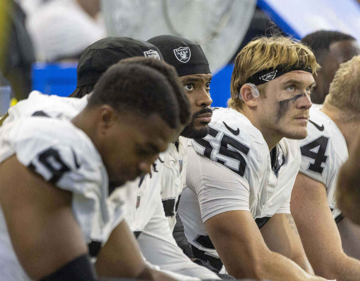 Raiders defenders, from left, Tyree Wilson (9), Elandon Roberts (52) and Cody Lindenberg (55) l ...