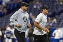 Raiders tight ends Michael Mayer, left, and Brock Bowers. run off of the field before an NFL ga ...