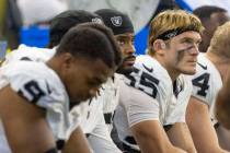 Raiders defenders, from left, Tyree Wilson (9), Elandon Roberts (52) and Cody Lindenberg (55) l ...