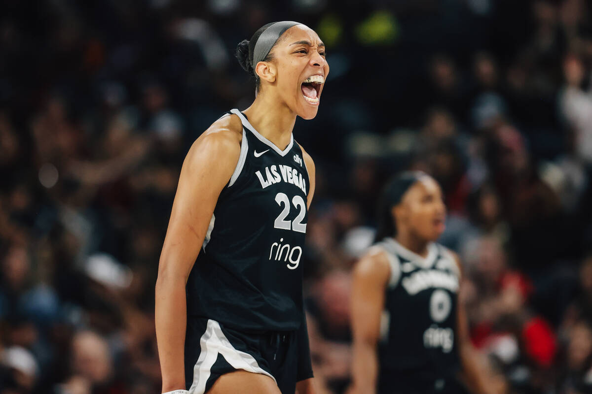 Aces center A'ja Wilson (22) celebrates during game two of of a WNBA finals game between t ...
