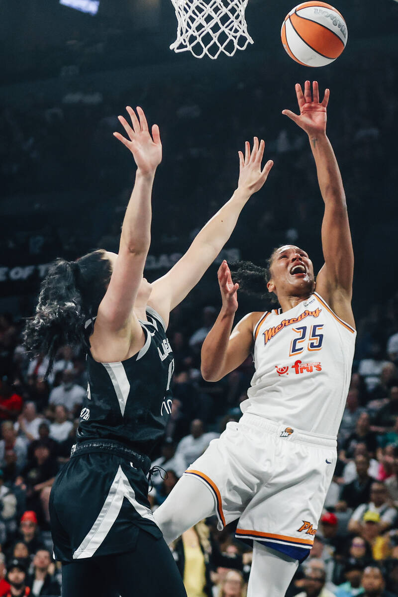 Phoenix Mercury forward Alyssa Thomas (25) goes for a layup during game two of of a WNBA finals ...