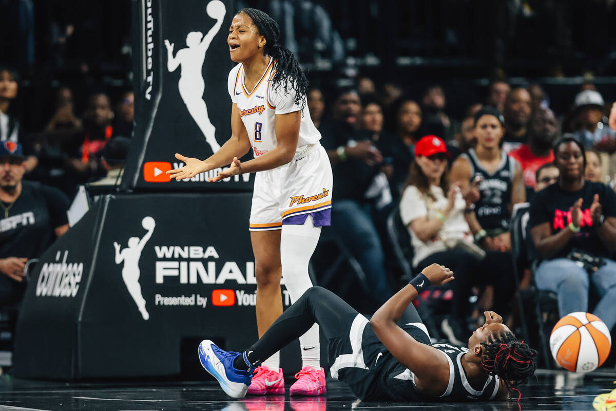 Phoenix Mercury guard Monique Akoa Makani (8) reacts as a referee calls a foul on her during ga ...