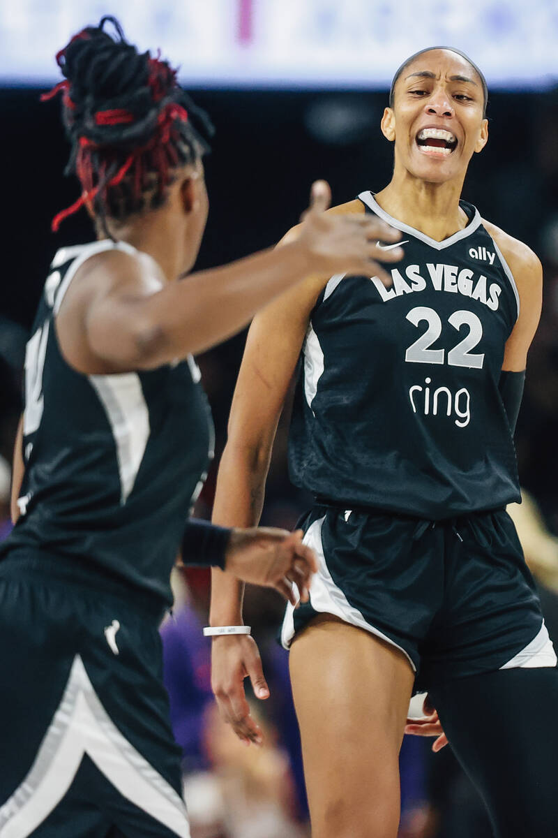 Aces center A'ja Wilson (22) celebrates during game two of of a WNBA finals game between t ...