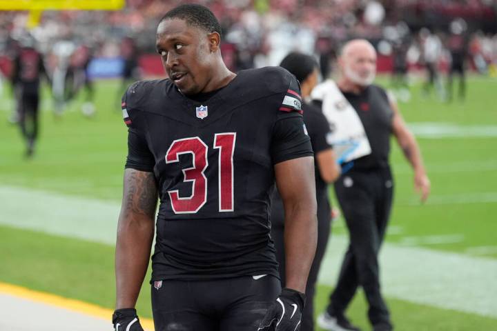 Arizona Cardinals running back Emari Demercado (31) reacts on the sideline after fumbling the b ...