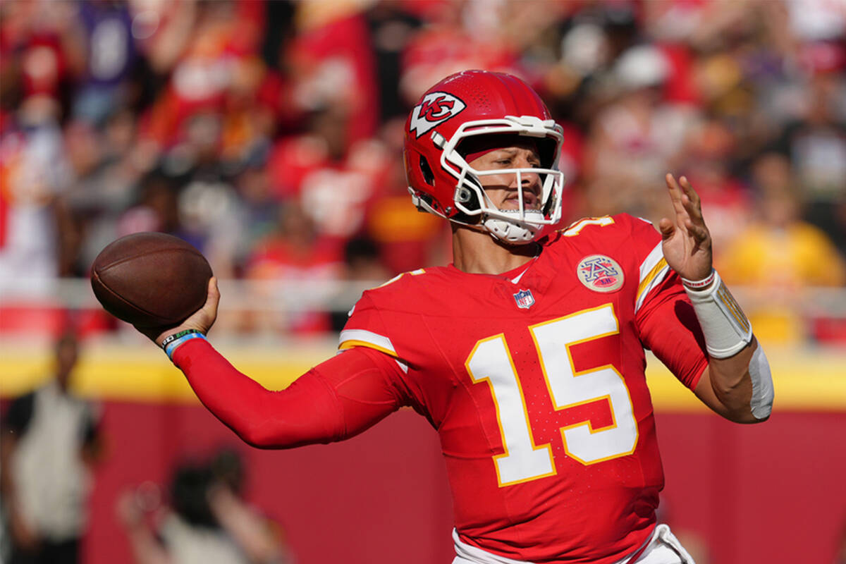 Kansas City Chiefs quarterback Patrick Mahomes passes against the Baltimore Ravens during an NF ...