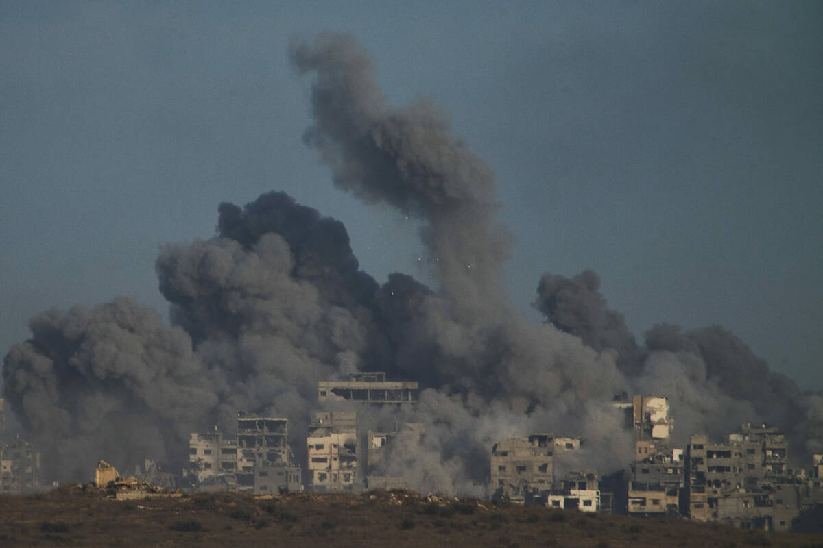 Smoke billows over Gaza Strip following an Israeli bombardment, as seen from southern Israel, S ...