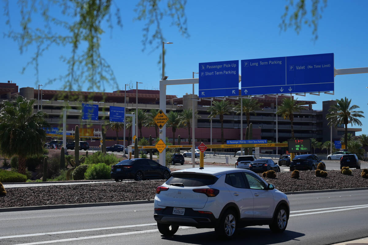 Auto traffic and parking garages are seen at Harry Reid International Airport Saturday, October ...