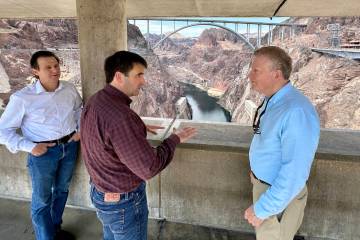 Scott Cameron, right, takes a tour of Hoover Dam in July. (Bureau of Reclamation)