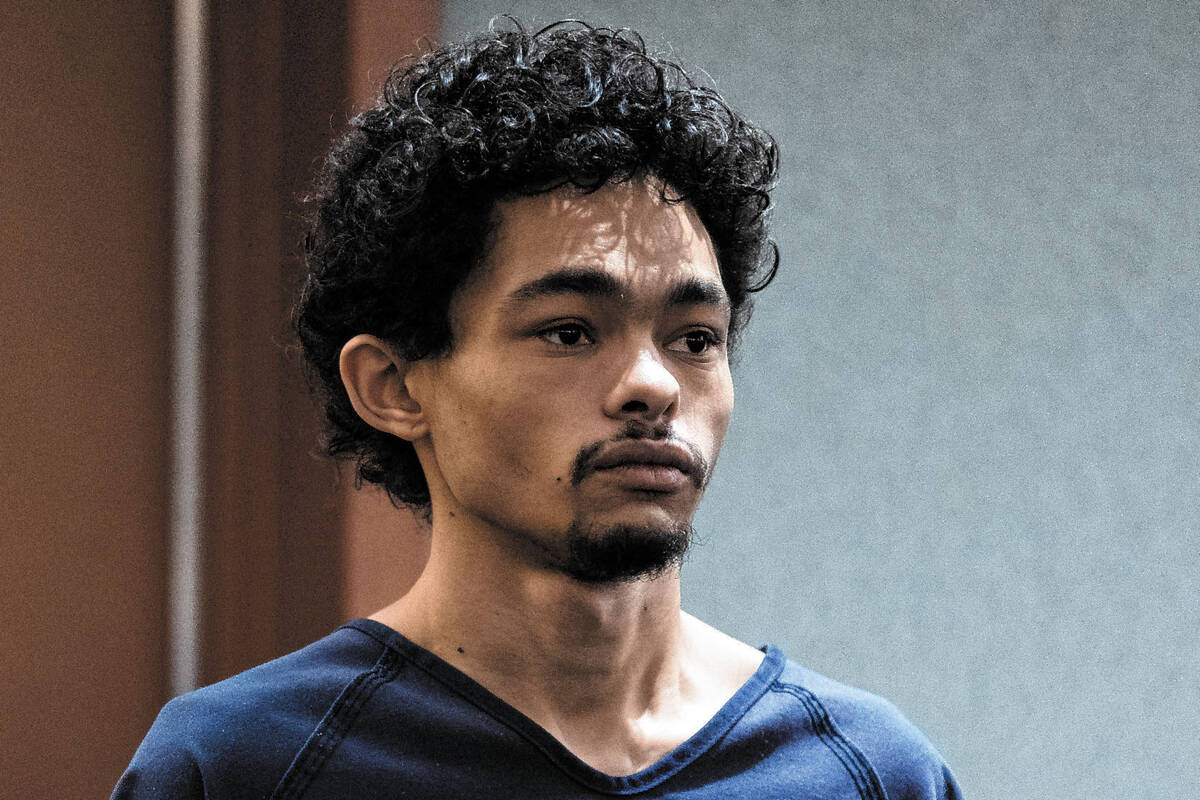 Tyson Hampton, accused of shooting and killing a Las Vegas police officer, appears for a court ...