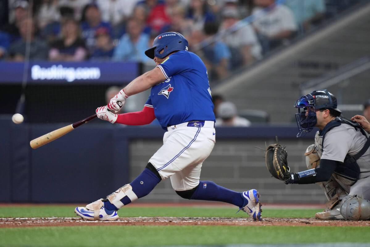 Toronto Blue Jays' Alejandro Kirk (30) hits a home run during the eighth inning against th ...