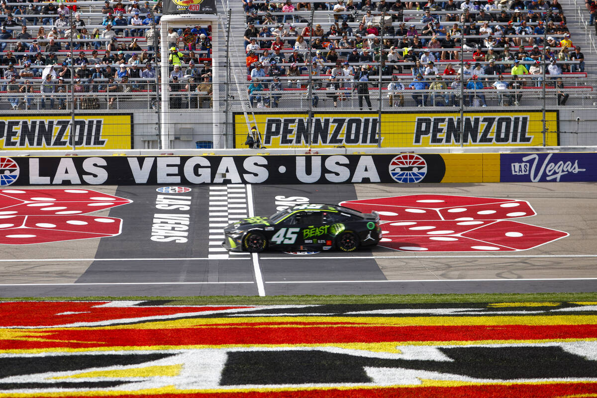 Driver Tyler Reddick (45) maintains the lead during the Pennzoil 400 NASCAR Cup Series race at ...