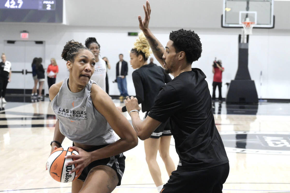 Las Vegas Aces practice player Jaire Roberts guards A’ja Wilson during the Aces first da ...