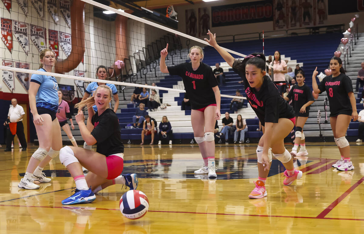 Coronado players watch the ball from Foothill land out of bounds, giving them the final point t ...