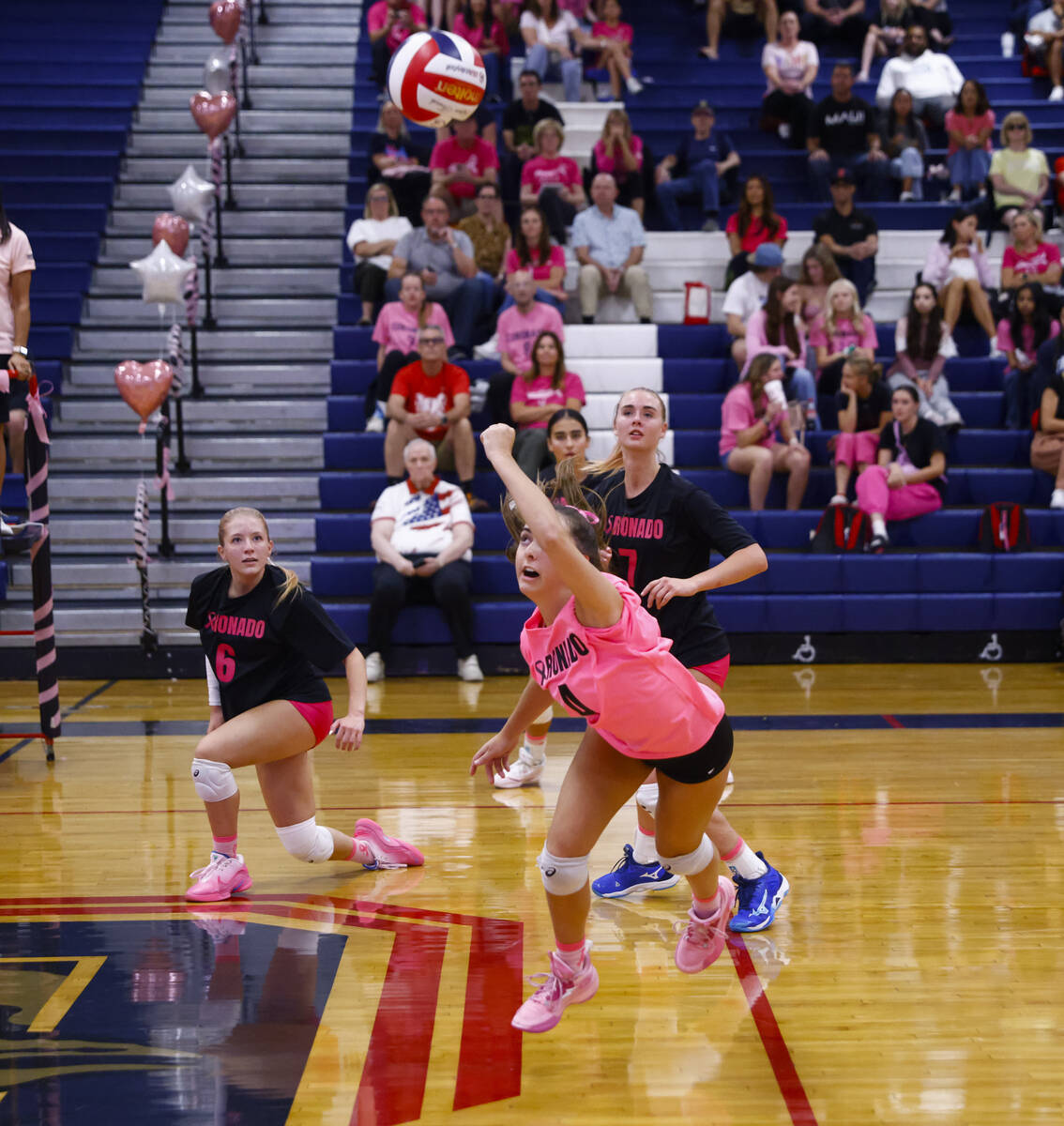 Coronado's Nakisa Friedman (4) tries to save the ball during a volleyball game against Foo ...