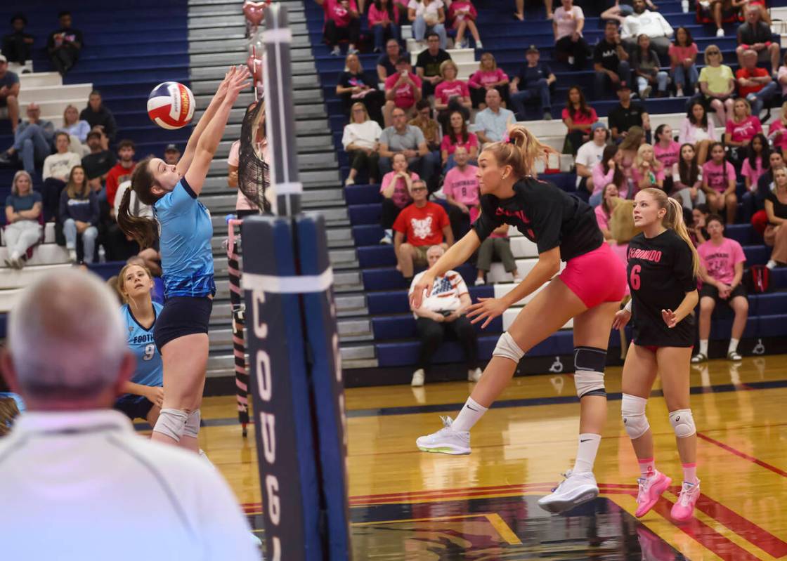 Coronado's Rachel Purser (9) gets the ball past Foothill during a volleyball game at Coron ...