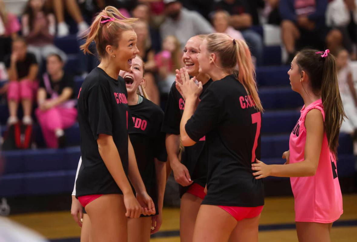 Coronado players celebrate after a play against Foothill during a volleyball game at Coronado H ...