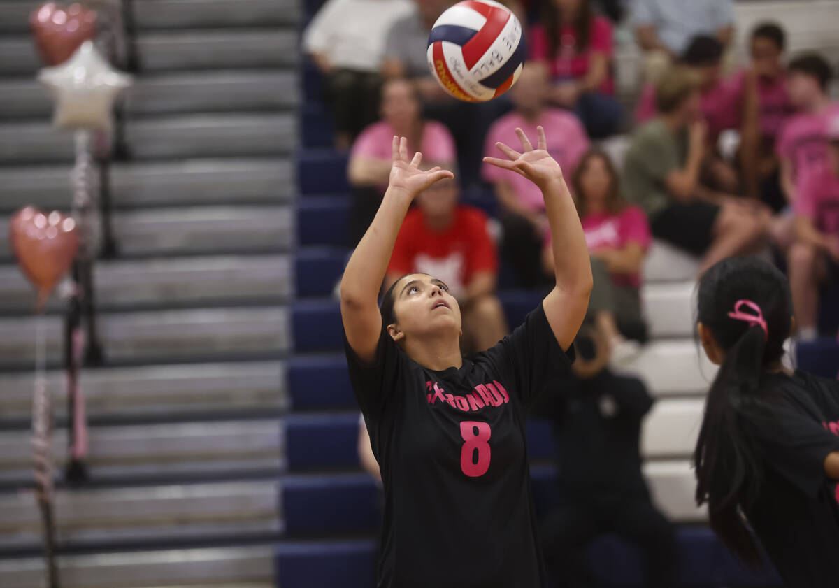Coronado's Alyssa Leone (8) sets the ball during a volleyball game against Foothill at Cor ...